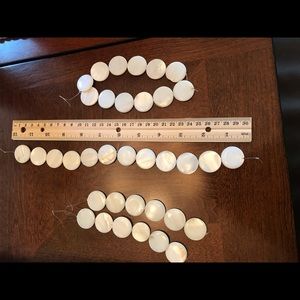 Round Lentil Natural shell beads.